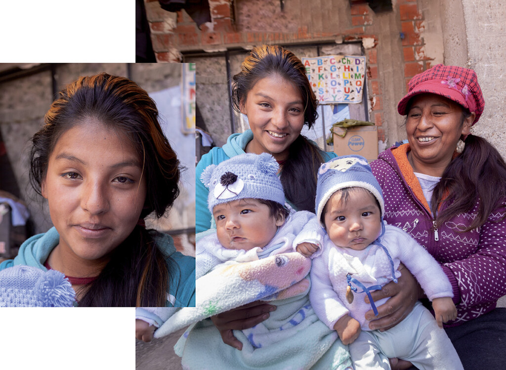 due donne con in braccio due neonati